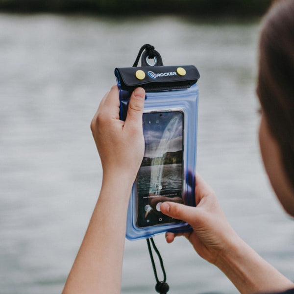 Person capturing a photo with the waterproof cell phone case  Lifestyle