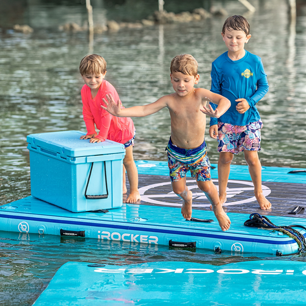Kids jumping on the floating swim mat  Lifestyle