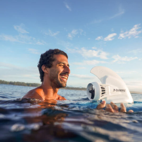 Man holding iROCKER Boost Fin in water  Lifestyle
