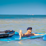 Man laying on the floating swim mat | Lifestyle