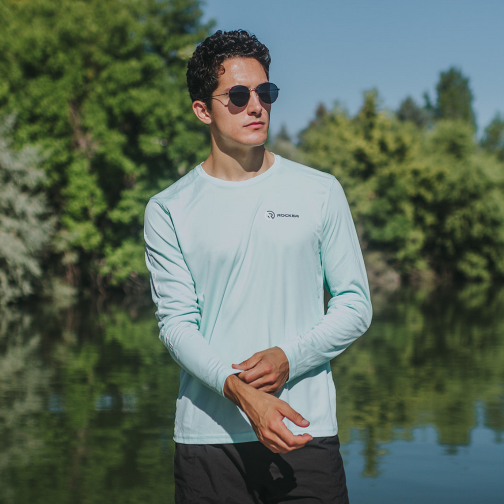 Young man wearing the ECO SOL LONG SLEEVE SHIRT