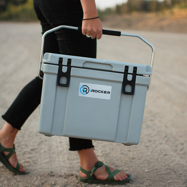 Person carrying iROCKER personal hard cooler