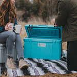 Person grabbing a drink from the Irocker hard cooler | Gray