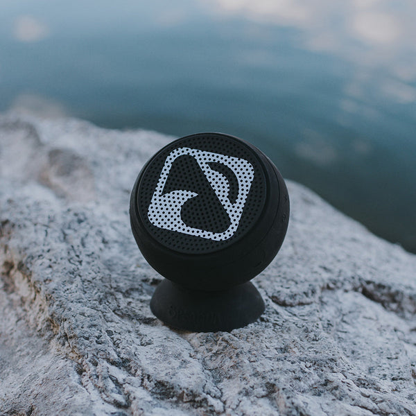 Waterproof speaker from the front with Blackfin logo  Black